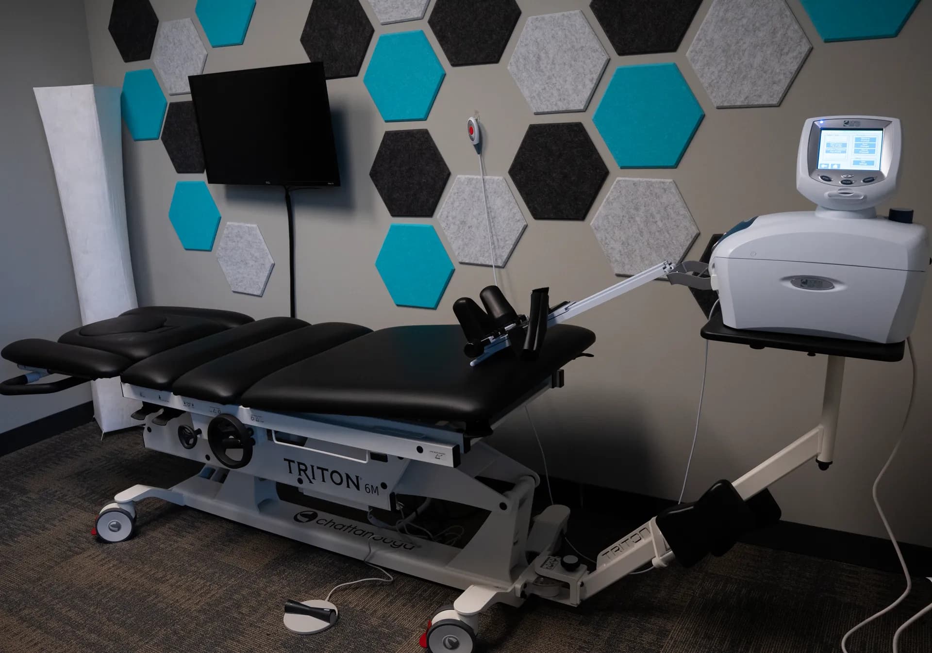 Treatment suite with the Triton spinal decompression table at SpineCo in Downers Grove, IL
